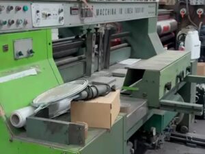 Curioni 180 CM – 2 colori stampa dal basso, slotter a teste mobili, pozzetto contascatole (Anno 1991)